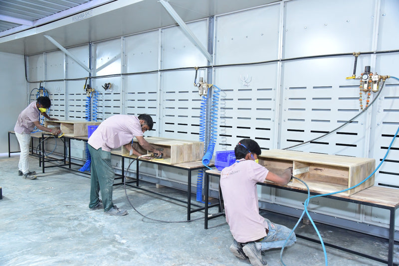 Furniselan craftsmen at work in the workshop